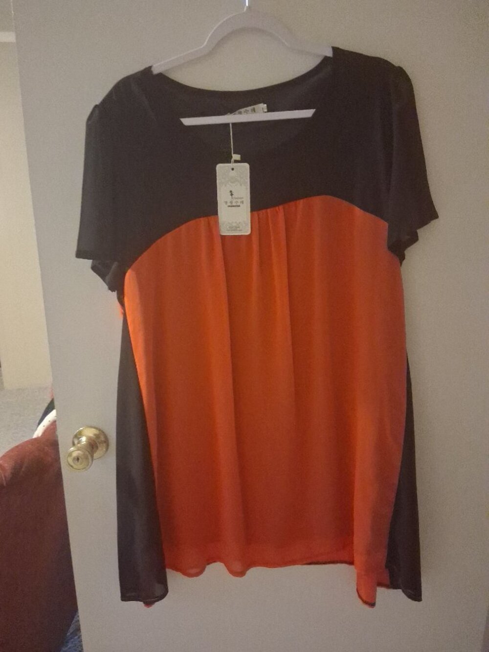 woman's orange and black mesh dressy blouse 3X